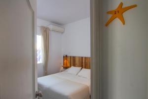 Postel nebo postele na pokoji v ubytování Hotel Finlandia
