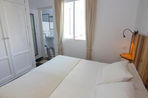Postel nebo postele na pokoji v ubytování Hotel Finlandia