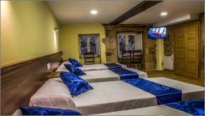 Katil atau katil-katil dalam bilik di Oxford Suites Santiago de Compostela
