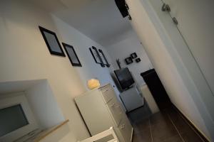 TV a/nebo společenská místnost v ubytování Aurelia Apartment