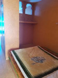 Postel nebo postele na pokoji v ubytování Residence Tafat