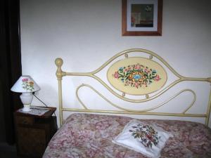 Postel nebo postele na pokoji v ubytování Albergo Ristorante Guidi