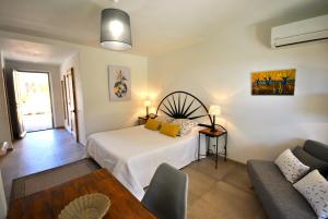 Postel nebo postele na pokoji v ubytování B&B La Badelle