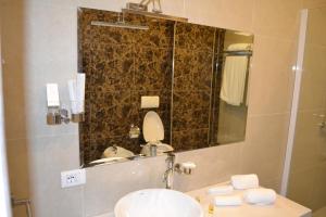 Baðherbergi á Havana Hotel