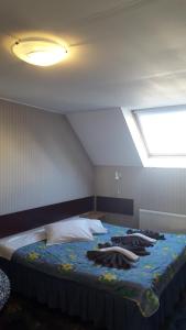 Una cama o camas en una habitación de Terve Hostel
