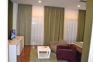 Sjónvarps- og/eða afþreyingartæki á Havana Hotel