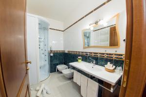 Koupelna v ubytování Hotel Al Ritrovo