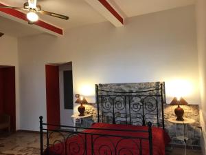 Letto o letti in una camera di B&B Villa Delle Rondini