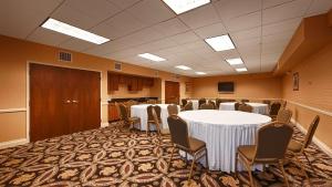 a conference room with tables and chairs in it at Best Western PLUS Hannaford Inn & Suites in Cincinnati +21 photos