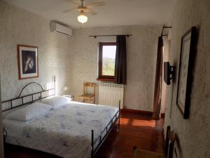 Postel nebo postele na pokoji v ubytování Rooms and Apartment Feral