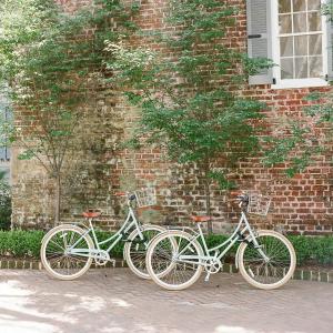 two bikes parked next to a brick wall at Zero George Hotel in Charleston