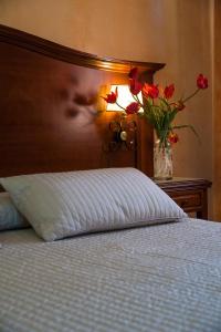 Postel nebo postele na pokoji v ubytování Hotel Al Ritrovo