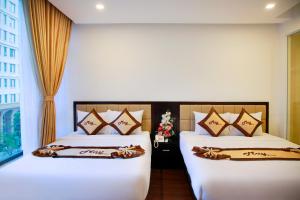 Voodi või voodid majutusasutuse May Hotel toas