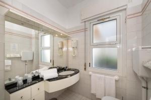 Koupelna v ubytování Hotel Morchio Mhotelsgroup