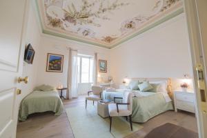 A bed or beds in a room at Il Leone Blu