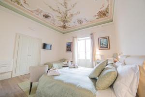 A bed or beds in a room at Il Leone Blu