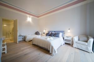A bed or beds in a room at Il Leone Blu
