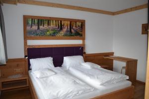 Postel nebo postele na pokoji v ubytování Bergsonne