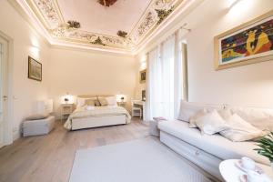 A bed or beds in a room at Il Leone Blu