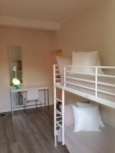 Postel nebo postele na pokoji v ubytování Residence Buelli e Dintorni