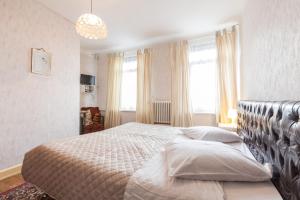Postel nebo postele na pokoji v ubytování Hotel DeFive