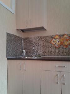 Una cocina o zona de cocina en Apartment on prospekt Mira 24