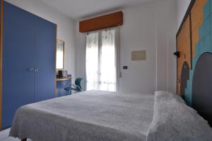 Postel nebo postele na pokoji v ubytování Hotel Rondinella