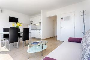 TV a/nebo společenská místnost v ubytování Adriatic Queen Rooms & Apartments