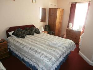 Postel nebo postele na pokoji v ubytování Monorene Guest House