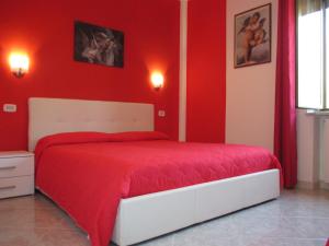 Posteľ alebo postele v izbe v ubytovaní Palinuro casa vacanze "Donna Antonia"