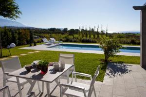 The swimming pool at or close to Villa Lefteris