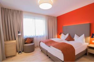 Postel nebo postele na pokoji v ubytování Garni Hotel Kessler