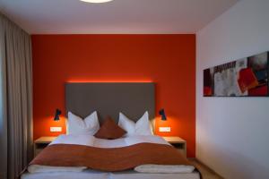 Postel nebo postele na pokoji v ubytování Garni Hotel Kessler