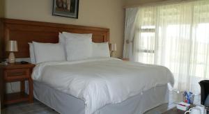 Mountain View Guest House tesisinde bir odada yatak veya yataklar