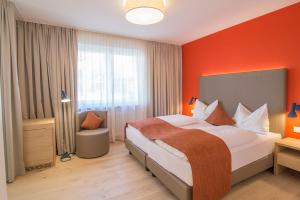 Postel nebo postele na pokoji v ubytování Garni Hotel Kessler