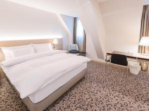 Katil atau katil-katil dalam bilik di Hotel Savoy