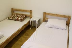 Postel nebo postele na pokoji v ubytování Hostel Jellostone