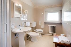 Koupelna v ubytování Albergo Mancuso del Voison