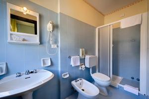 Koupelna v ubytování Albergo Mancuso del Voison