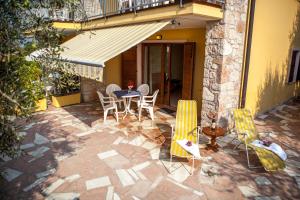 Patio nebo venkovní prostory v ubytování Taki Village