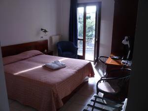 Postel nebo postele na pokoji v ubytování Hotel L'Ancora