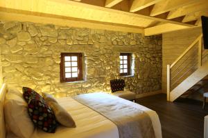 Кровать или кровати в номере Le Vieux Logis