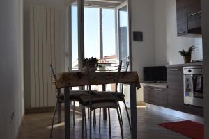 A television and/or entertainment centre at Appartamenti Torre