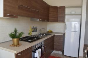 A kitchen or kitchenette at Appartamenti Torre