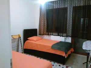 Evim Trabzon Apartmentにあるベッド