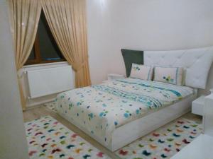 Evim Trabzon Apartmentにあるベッド