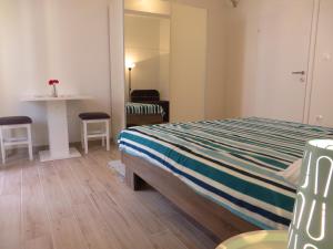 Postel nebo postele na pokoji v ubytování Apartments Karaba