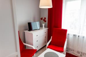 TV a/nebo společenská místnost v ubytování Grey House
