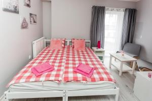 Postel nebo postele na pokoji v ubytování Grey House