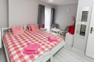 Postel nebo postele na pokoji v ubytování Grey House